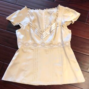 Beautiful gold silky blouse, decorative detailing